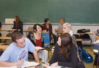 Students collaborating in class