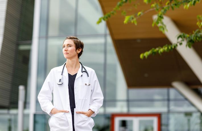 Portland State University clinical health student standing outside