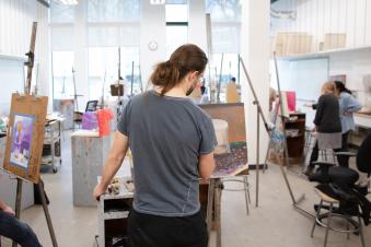 Portland State University art practice students working in an art studio