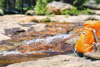 outdoors with hiking gear