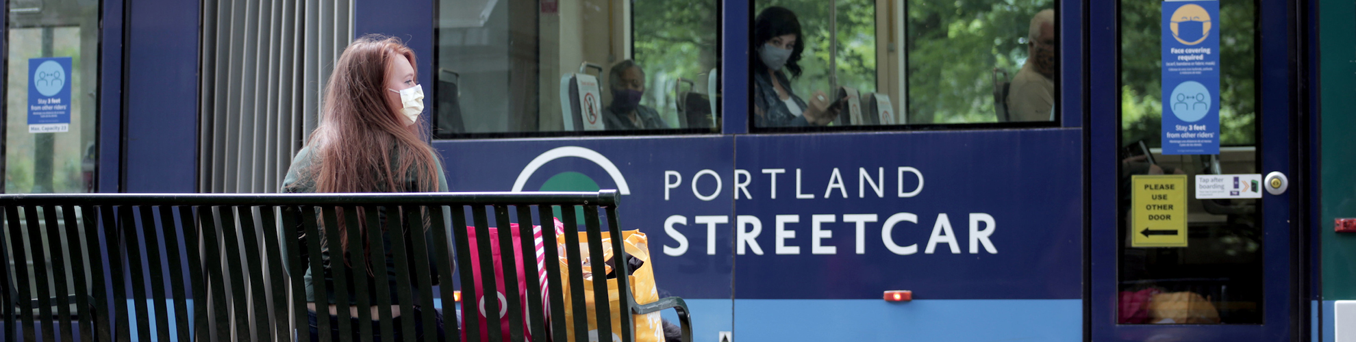 PSU student waiting for the Streetcar on campus