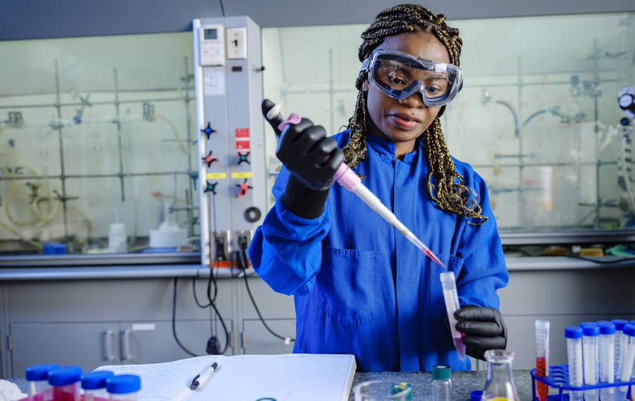 Graduate student in chemistry lab