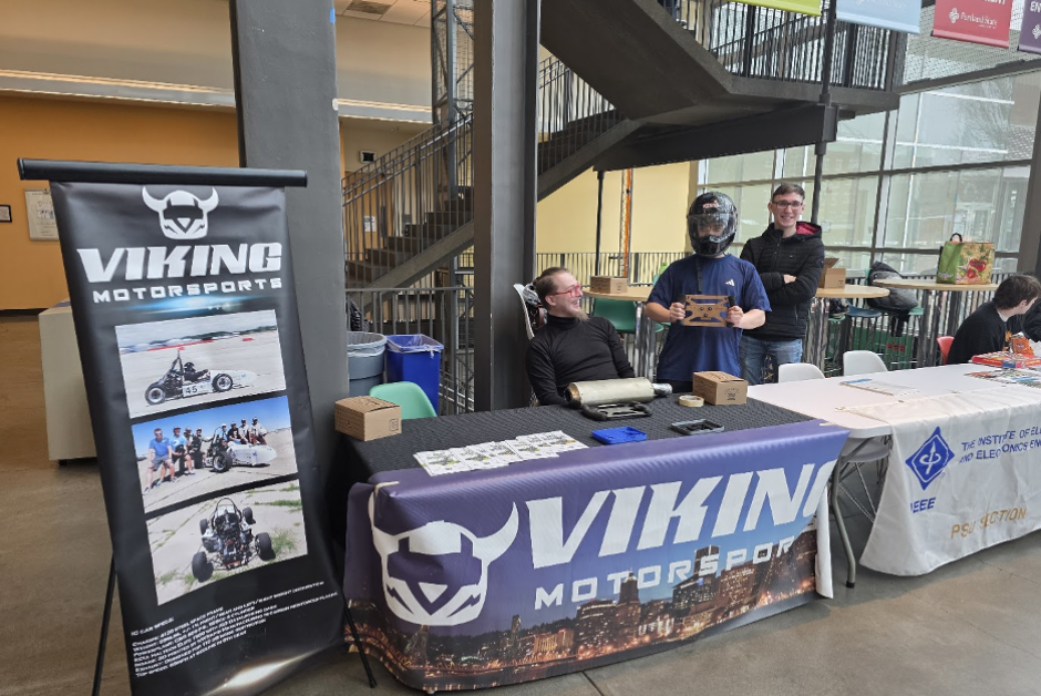 Finance Major Ben Soderquist, Electrical Engineering Major Anthony Dinh, and Pre-Law student Xander Volk, tabling during MCECS Winter club mixer - Engineering Building Atrium- Portland State University, Maseeh College of Engineering and Computer Science 