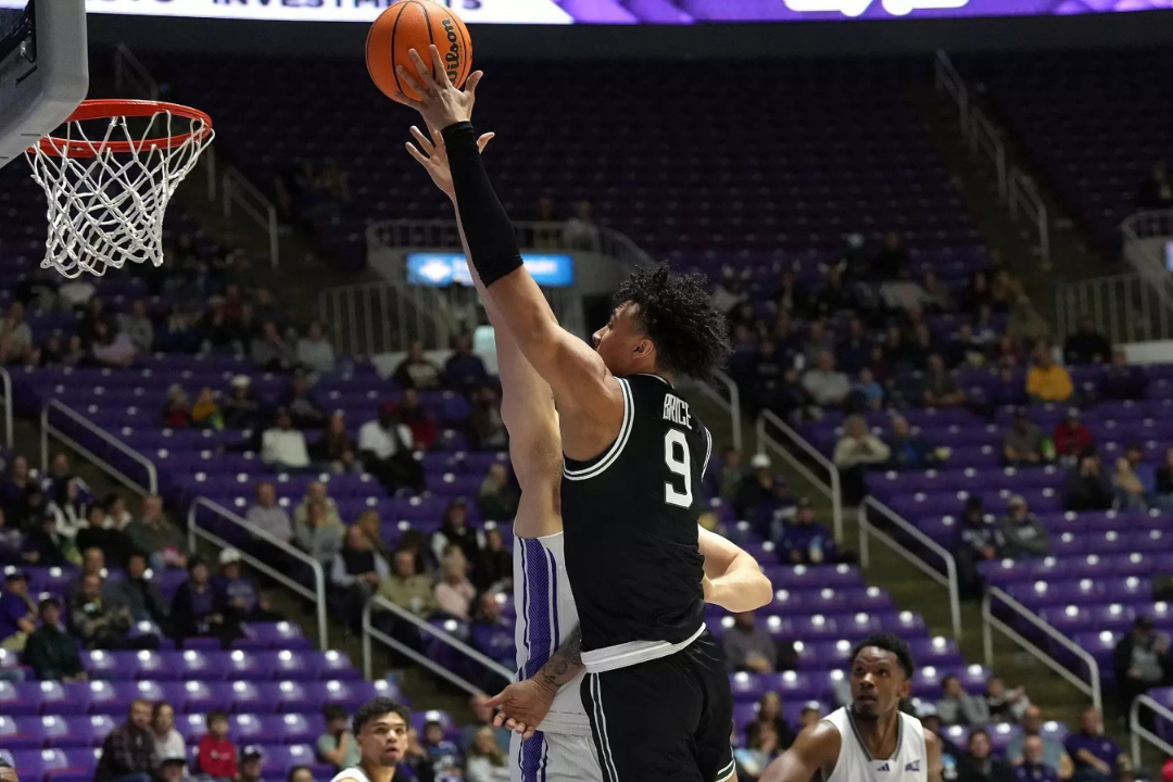 Isaac Brice shoots a basket