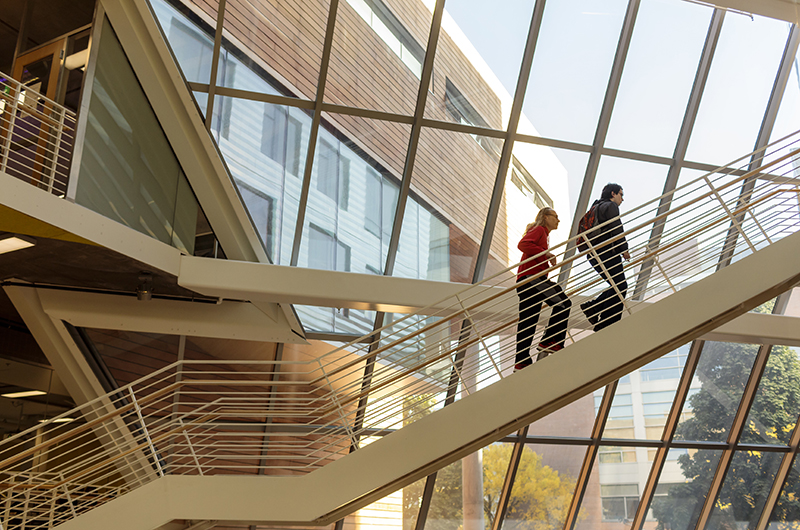 Students going to class in the Karl Miller Center