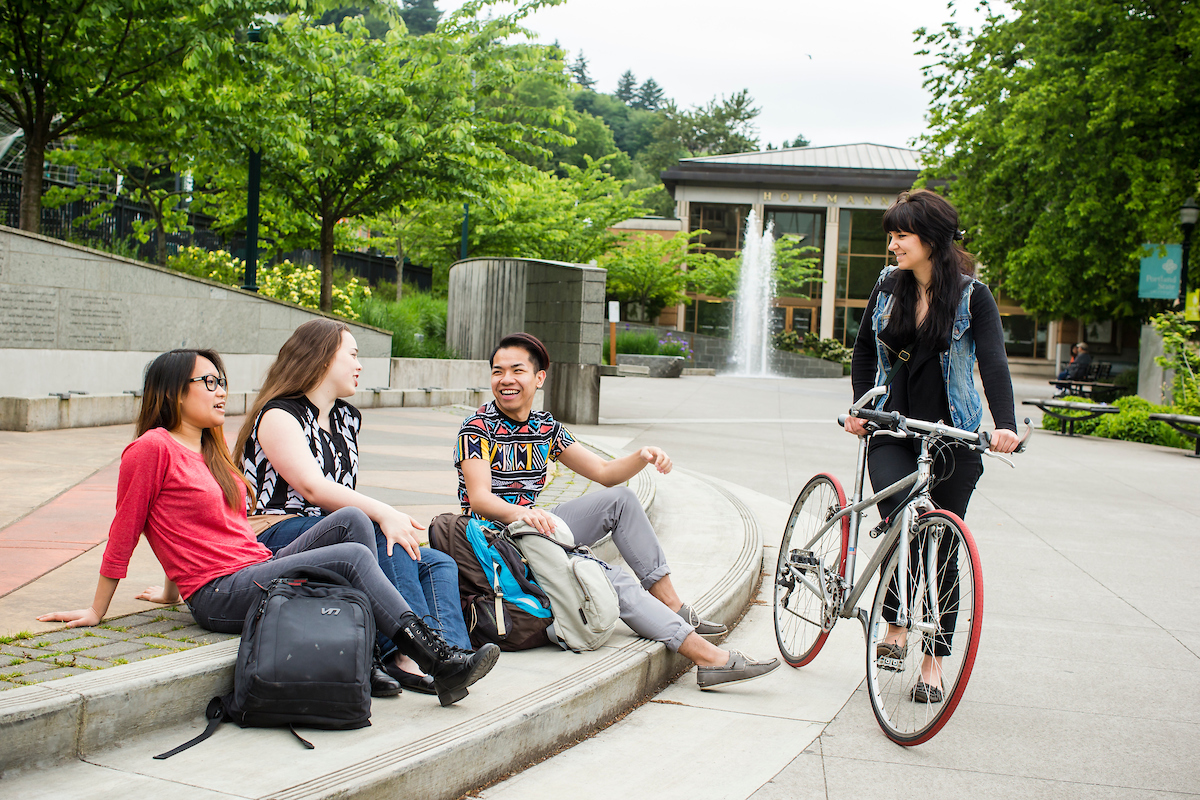 students talking outside