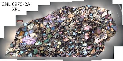 colorful image of a slice of a meteorite 
