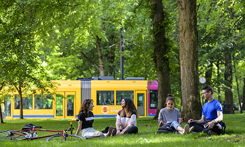 PSU students relaxing in the Park Blocks