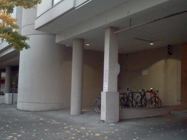 There is a parking garage and building.