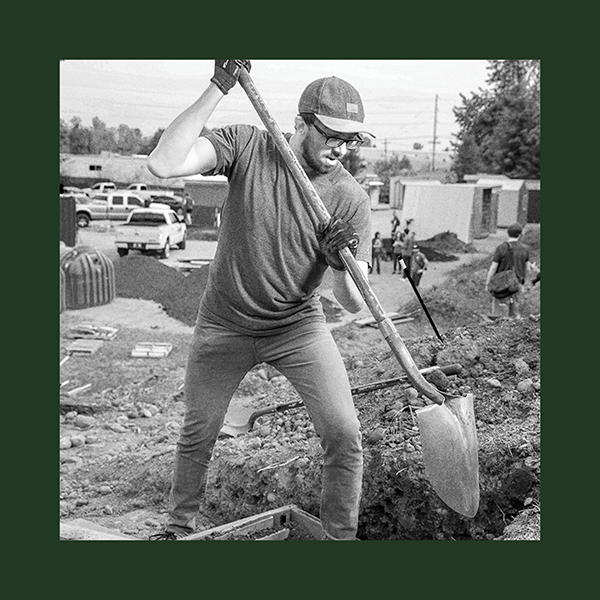 PSU student helping to build a tiny house