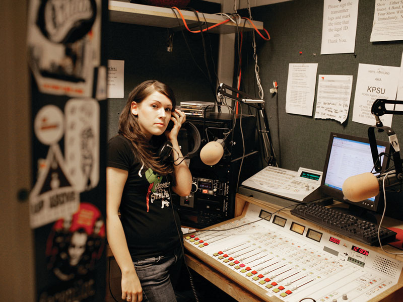 student working at radio station