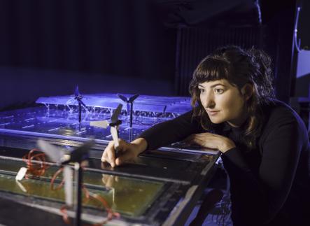woman working on wind tunnel experiment