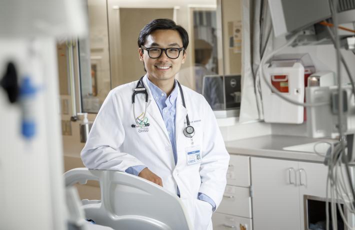 An OHSU doctor standing in a medical room. 