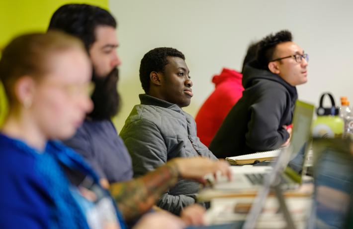 PSU Communications sciences and disorders undergraduate students in class listening