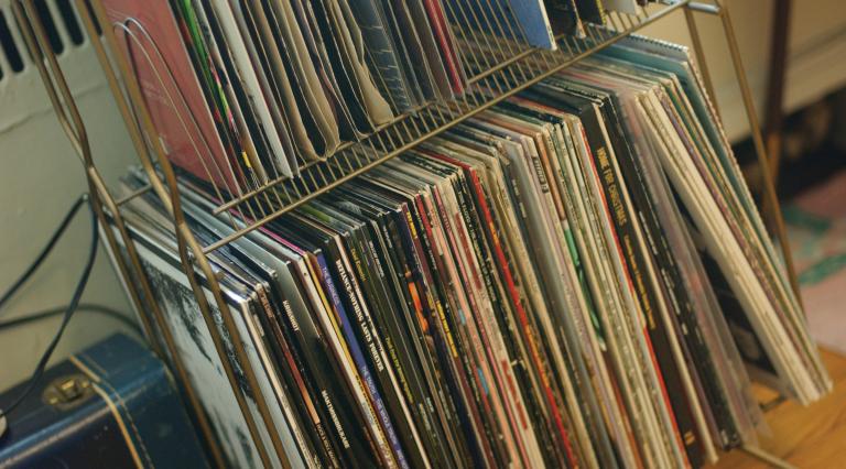 Records lined up on a shelf