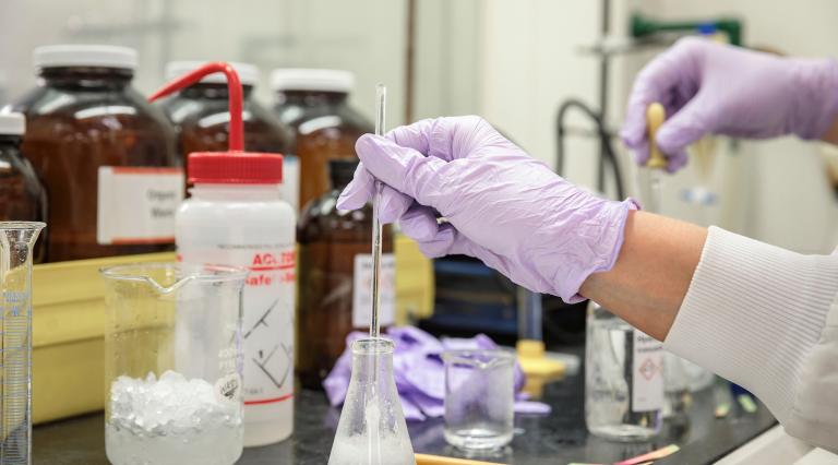 Portland State University chemistry students doing an experiment in a lab