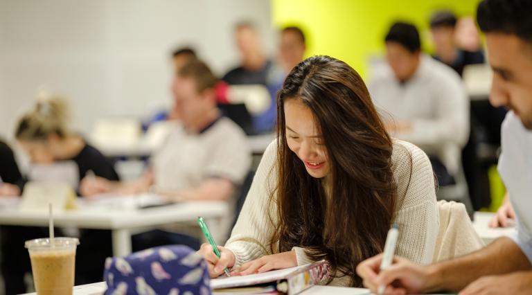 Students taking notes