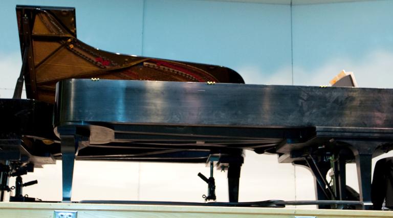 two PSU music students performing on pianos