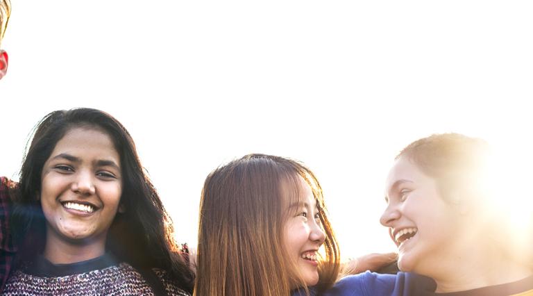 group of young students relaxing