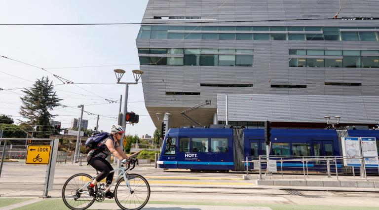 Biker going past PSU/OHSU Health