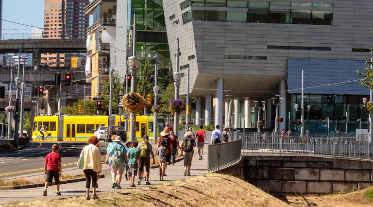 People walking in front of OHSU-PSU building
