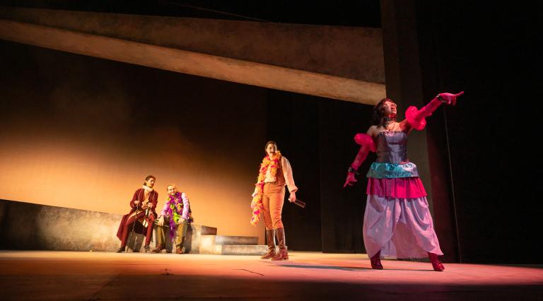 Students performing on stage for a theater production