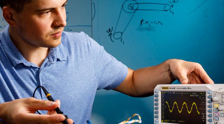 Student working on a seismograph