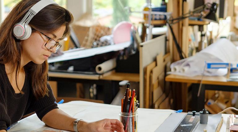 Student in the architecture studio working on a project