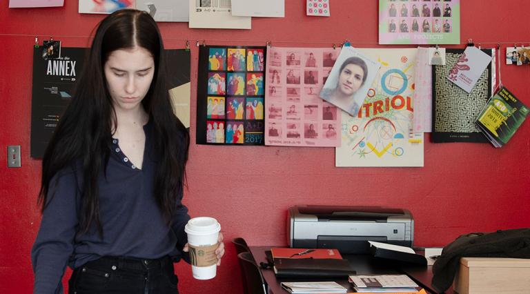 Student looking an an art book