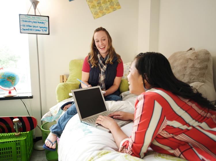 Students hanging out in a dorm room