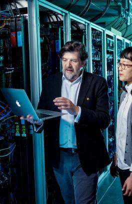 Professor and student in server room