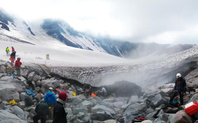 Researchers collect samples from Mount St. Helens to analyze for life signs using digital holographic microscopy.