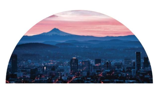 Portland skyline at sunset with Mount Hood in the background