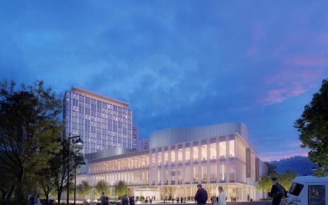 Architectural rendering of the proposed PSU Performing Arts and Culture Center building at dusk