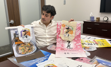 Hunter Iddlings reviewing packaging at BioShell office