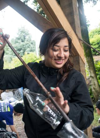 Student working on a bottle recycling project
