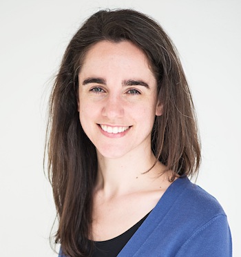 Picture of Hannah Cohen-Cline – young White woman with straight dark brown hair, smiling at the camera