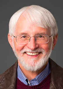 Picture of Wayne Wakeland, an older white man with gray hair smiling at camera.