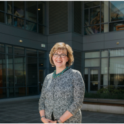 Image of Former Dean Lauran Nissen standing outside