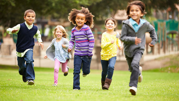 Kids running through park