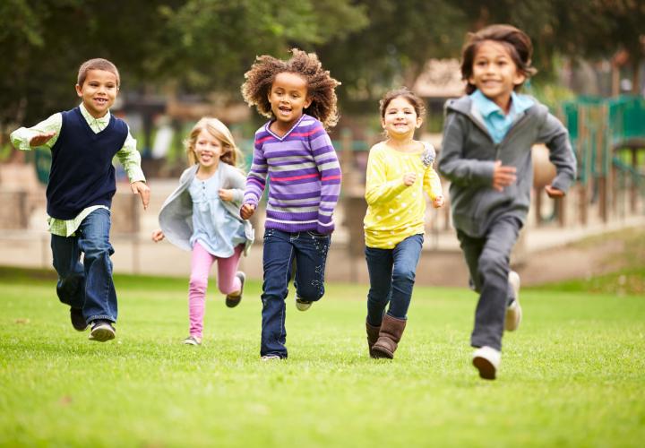 Kids running through park