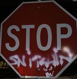 Roberts photo is of a graffetied stop sign
