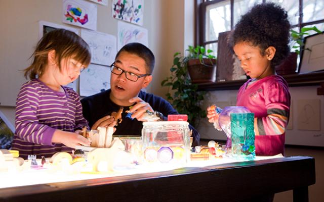 PSU Speech and Hearing student working with a child