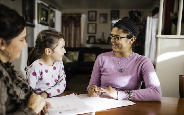 PSU Speech and Hearing student working with a child