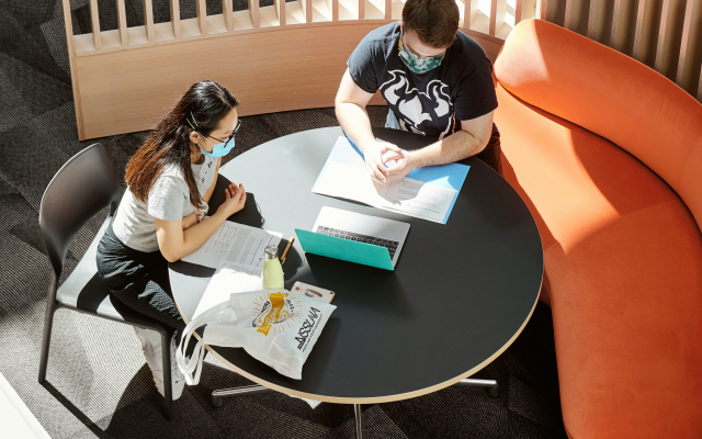 studying together in FMH with masks and snacks