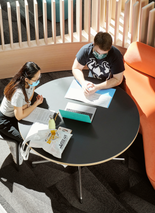 studying together in FMH with masks and snacks