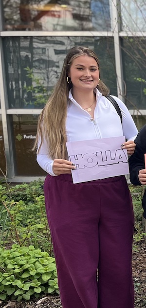 Emma Schneider working with HOLLA