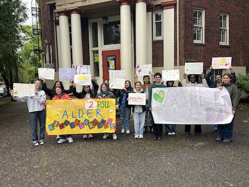 PSU students greet students from Alder Elementary School