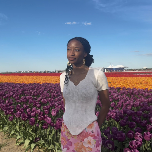 Aliviah in a flower field