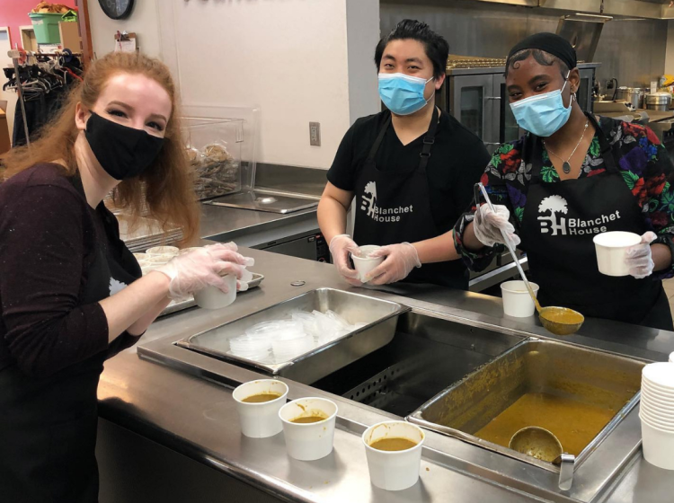 Picture of people serving food